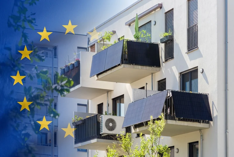 Composición de la bandera de la Unión Europea en fundido con un edificio con paneles solares y bombas de calor